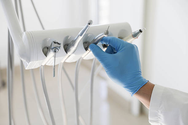 Professional Tooth Extraction technician working in Canon, GA